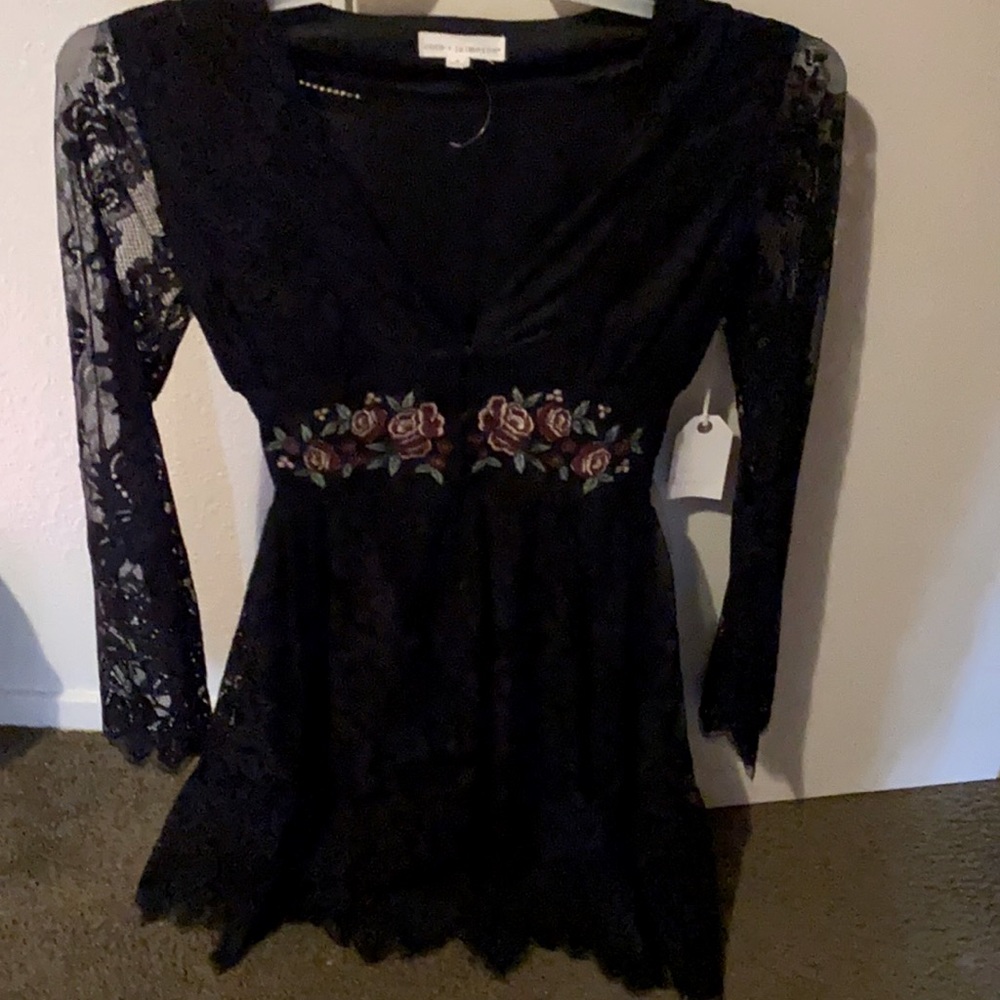 Beautiful black dress lace sleeves roses across waste right at the bus line